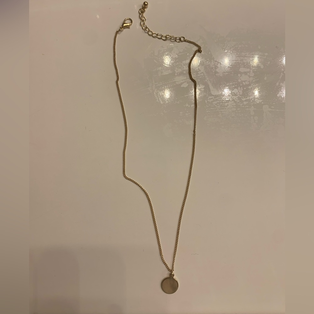 Gold circle necklace! never worn! Got from kohl’s a while ago